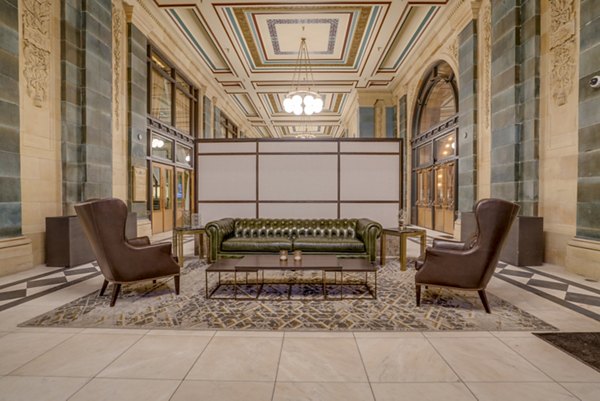 Clubhouse lounge with elegant furnishings at The Pennsylvanian Apartments