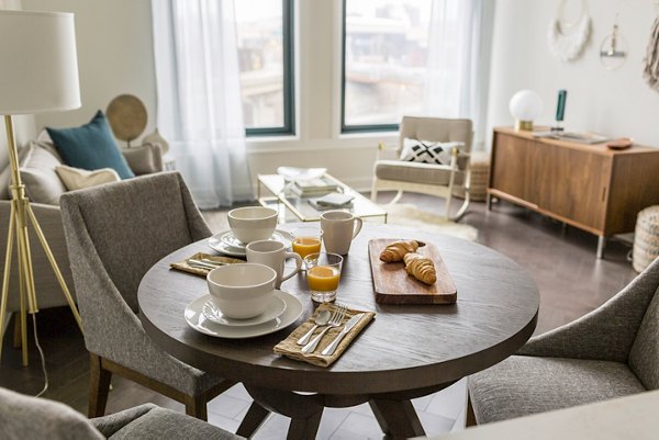 Elegant dining room with vintage decor in The Pennsylvanian Apartments, luxury living in a historic Greystar property