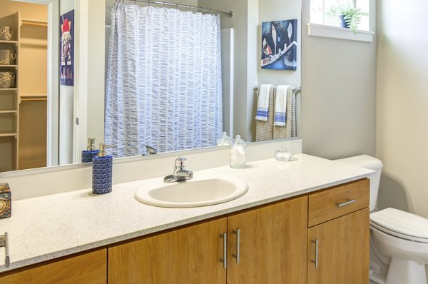 Bathroom featuring sleek design and modern fixtures at North Bethany Ridge Apartments in Beaverton