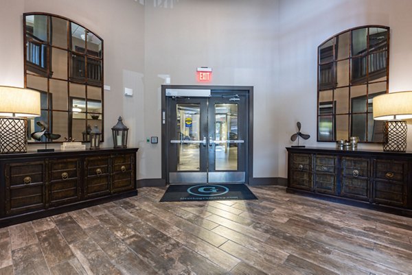 Clubhouse featuring modern design and lounge seating at The Gramercy Apartments, luxury living in a vibrant community