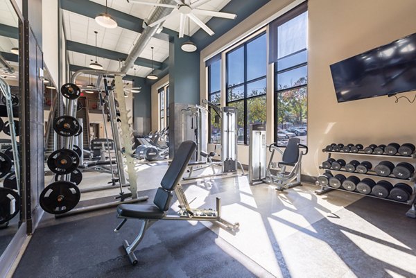 Fitness center with state-of-the-art equipment at The Gramercy Apartments, catering to luxury apartment residents seeking a healthy lifestyle