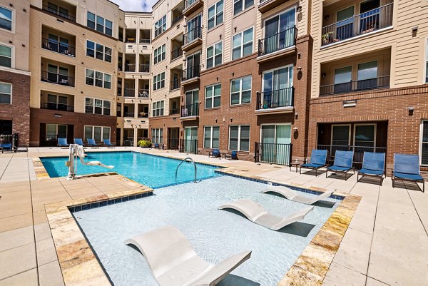 Modern rooftop pool at The Gramercy Apartments offering skyline views in downtown area