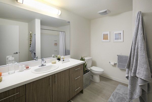 Modern bathroom with sleek fixtures at Foundry Commons Apartments, offering luxury living in a stylish environment