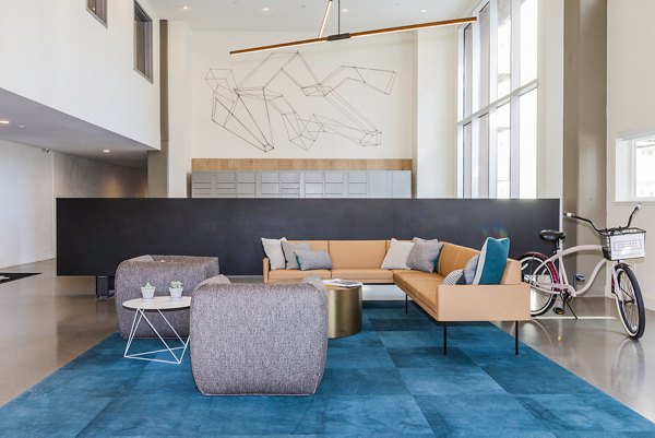 Clubhouse featuring modern interiors and communal seating at Foundry Commons Apartments