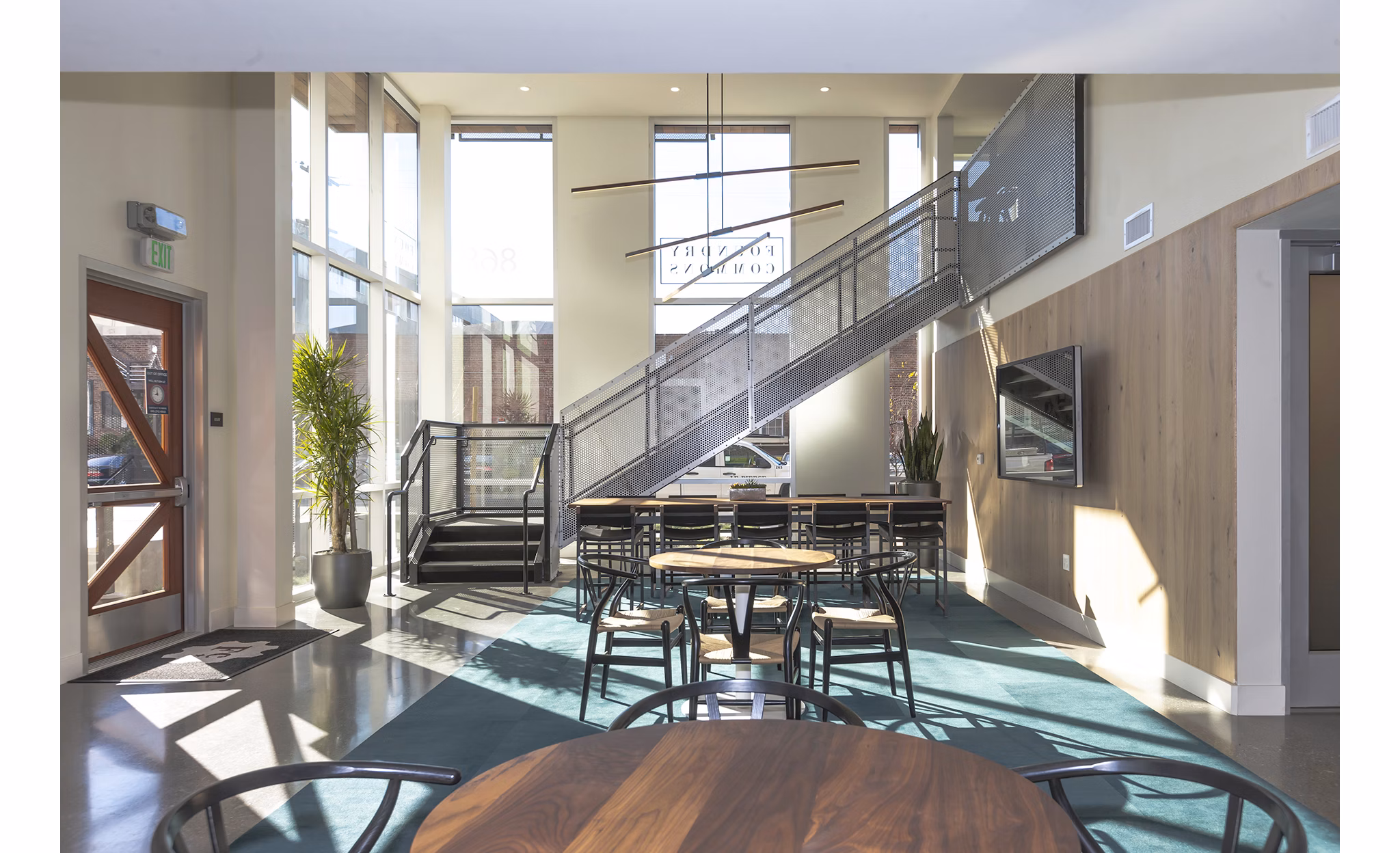 Clubhouse designed for relaxation and socializing at Foundry Commons Apartments, featuring modern furnishings and open spaces