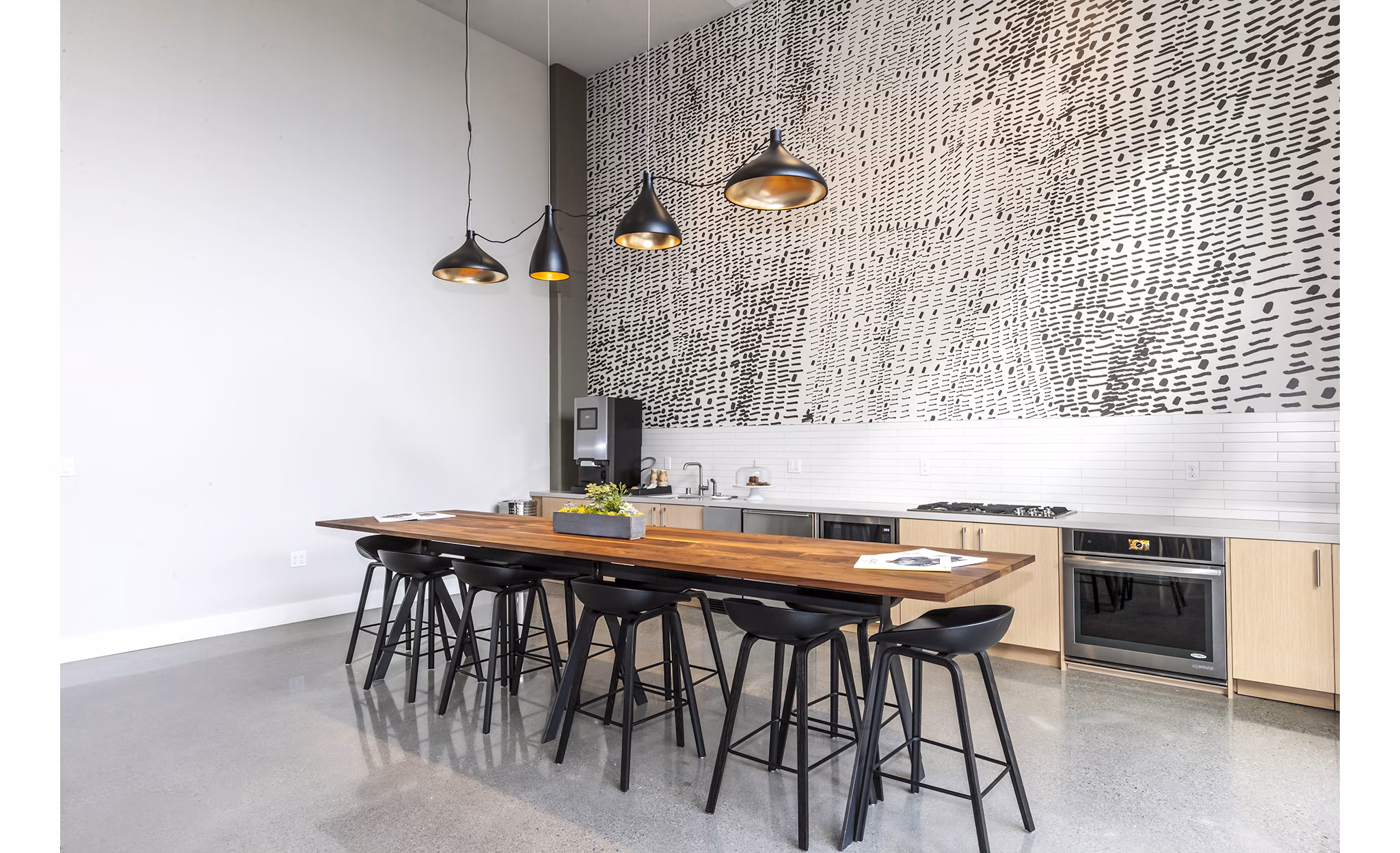 Clubhouse featuring modern design and comfortable seating at Foundry Commons Apartments