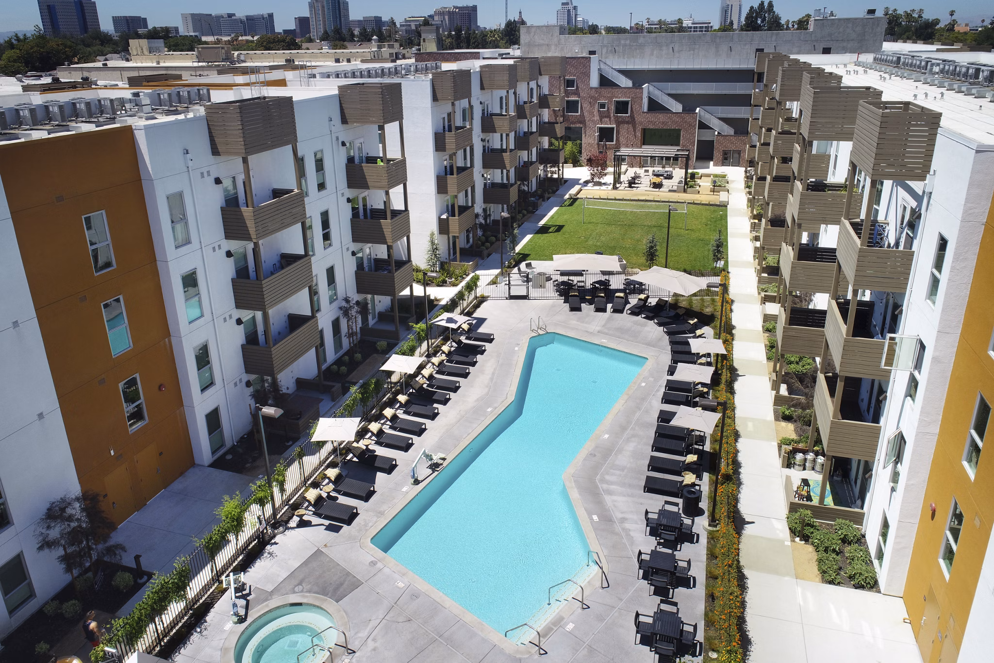 Luxury apartments with a swimming pool and landscaped courtyard in a vibrant community