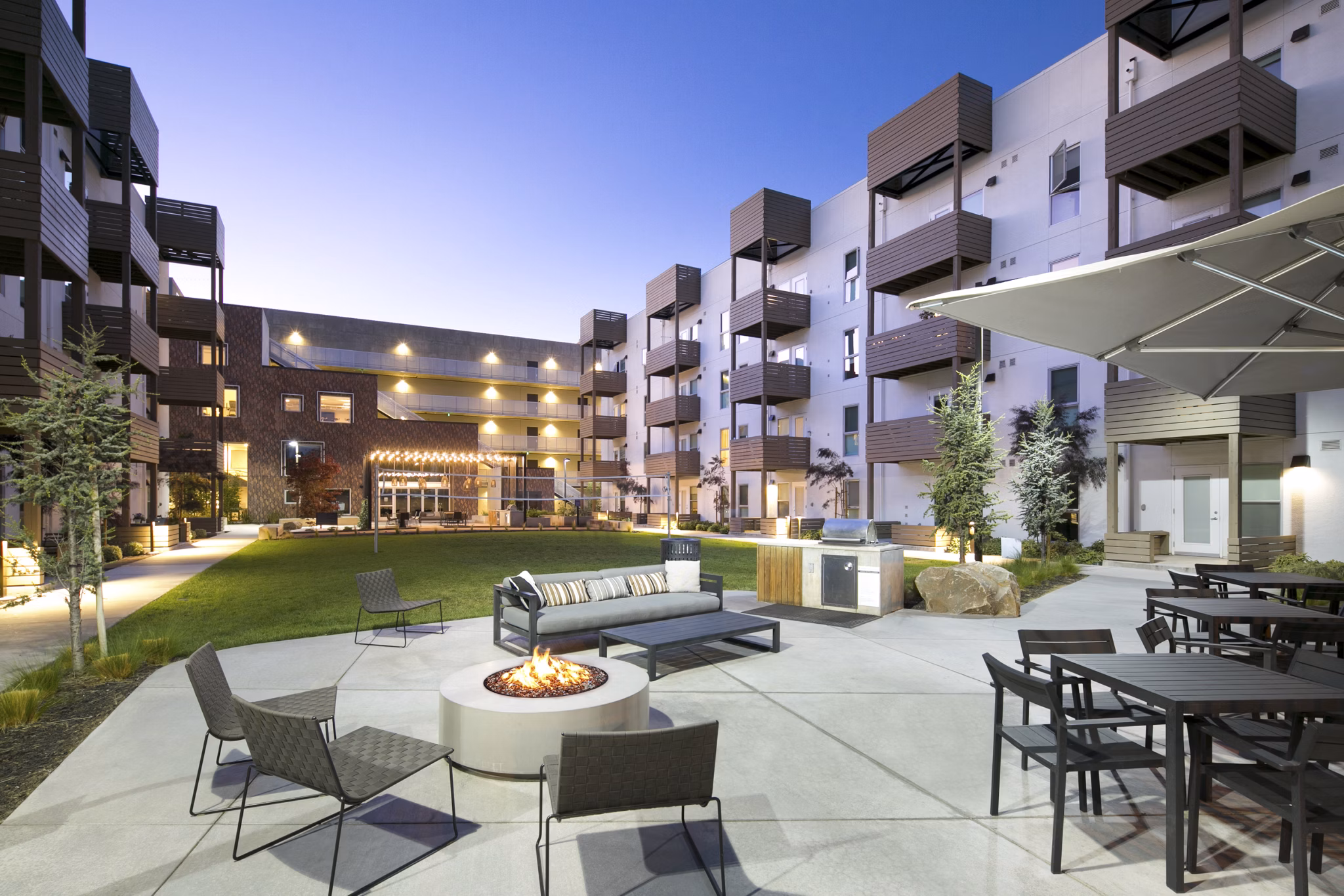 Cozy outdoor fire pit area at Foundry Commons Apartments, perfect for social gatherings and relaxation
