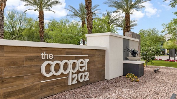 signage at The Cooper 202 Apartments