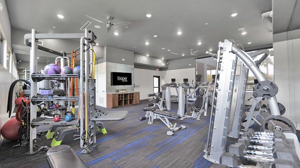 fitness center at The Cooper 202 Apartments