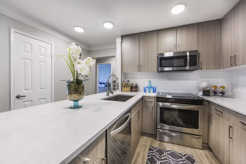 Modern kitchen with stainless steel appliances at Avana Rancho Palos Verdes luxury apartments