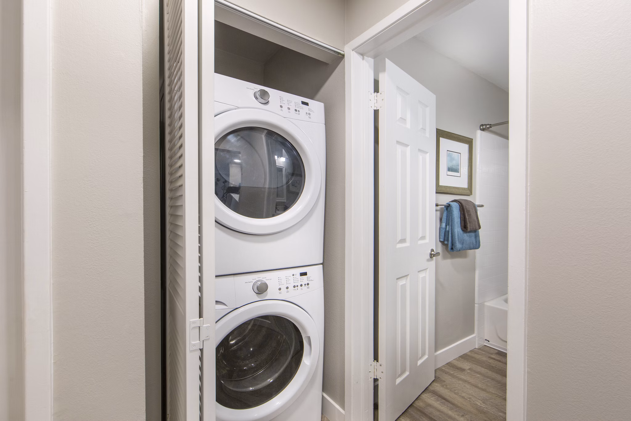 Laundry room with modern appliances at Avana Rancho Palos Verdes Apartments, luxury living space in picturesque Southern California