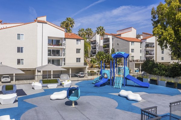 Colorful playground at Avana Rancho Palos Verdes Apartments designed for fun and safety in a family-friendly community setting
