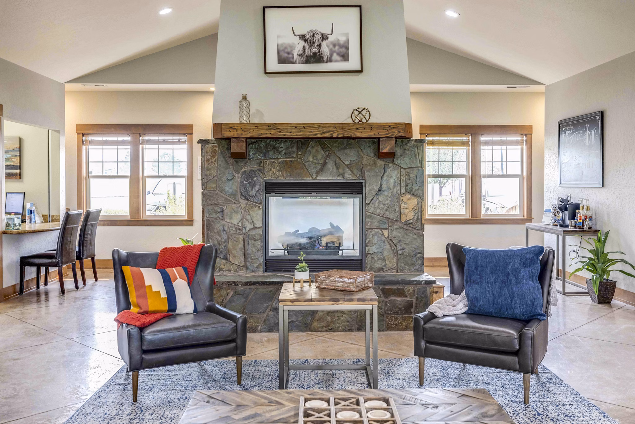 Luxurious clubhouse featuring modern decor and spacious seating at Carrington Place Apartments