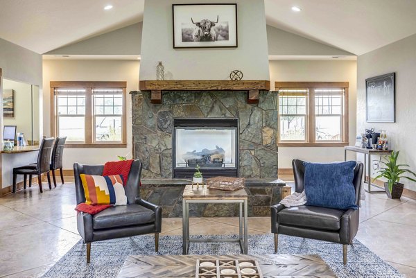 Luxurious clubhouse featuring modern decor and spacious seating at Carrington Place Apartments