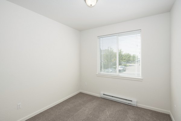Cozy bedroom with modern decor at Villas at Tullamore Apartments