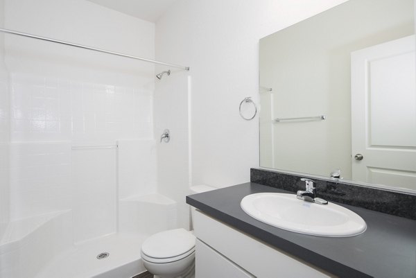 Contemporary bathroom with sleek fixtures at Villas at Tullamore Apartments