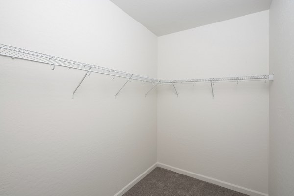 Spacious closet with built-in shelving in Villas at Tullamore Apartments, providing ample storage for residentsâ€™ convenience