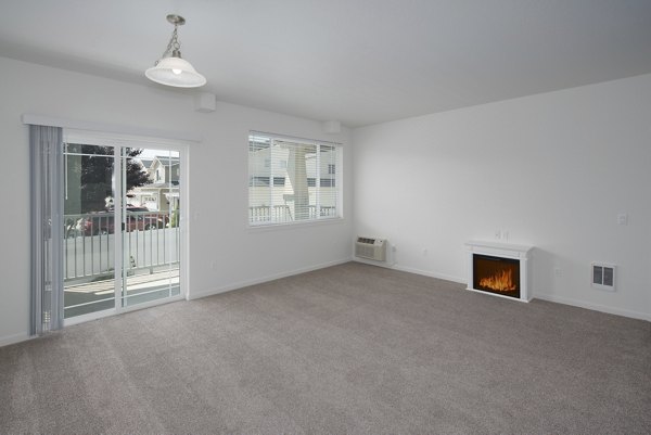 Modern living room featuring luxury furnishings at Villas at Tullamore Apartments