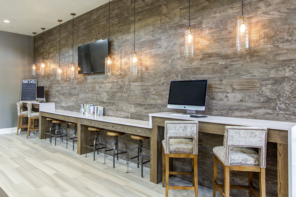 Modern business center with coworking spaces at Bridgeside at Patriots Point Apartments