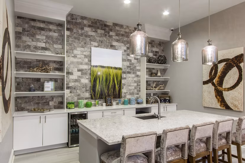 Elegant clubhouse with cozy seating and modern decor at Bridgeside at Patriots Point Apartments