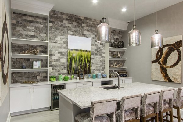 Elegant clubhouse with cozy seating and modern decor at Bridgeside at Patriots Point Apartments