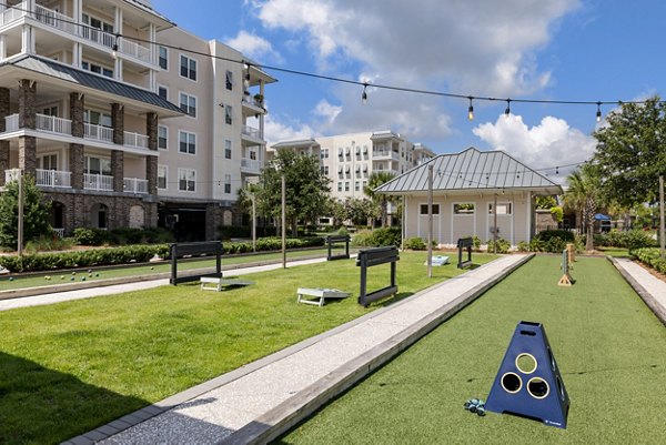 Sports court for tennis and basketball at Bridgeside at Patriots Point Apartments, offering active living amenities