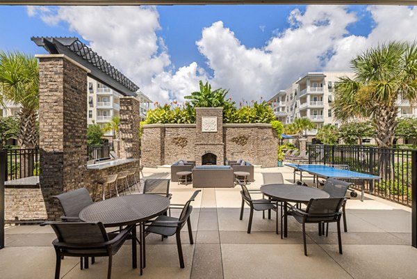 Tranquil courtyard with lush greenery at Bridgeside at Patriots Point Apartments