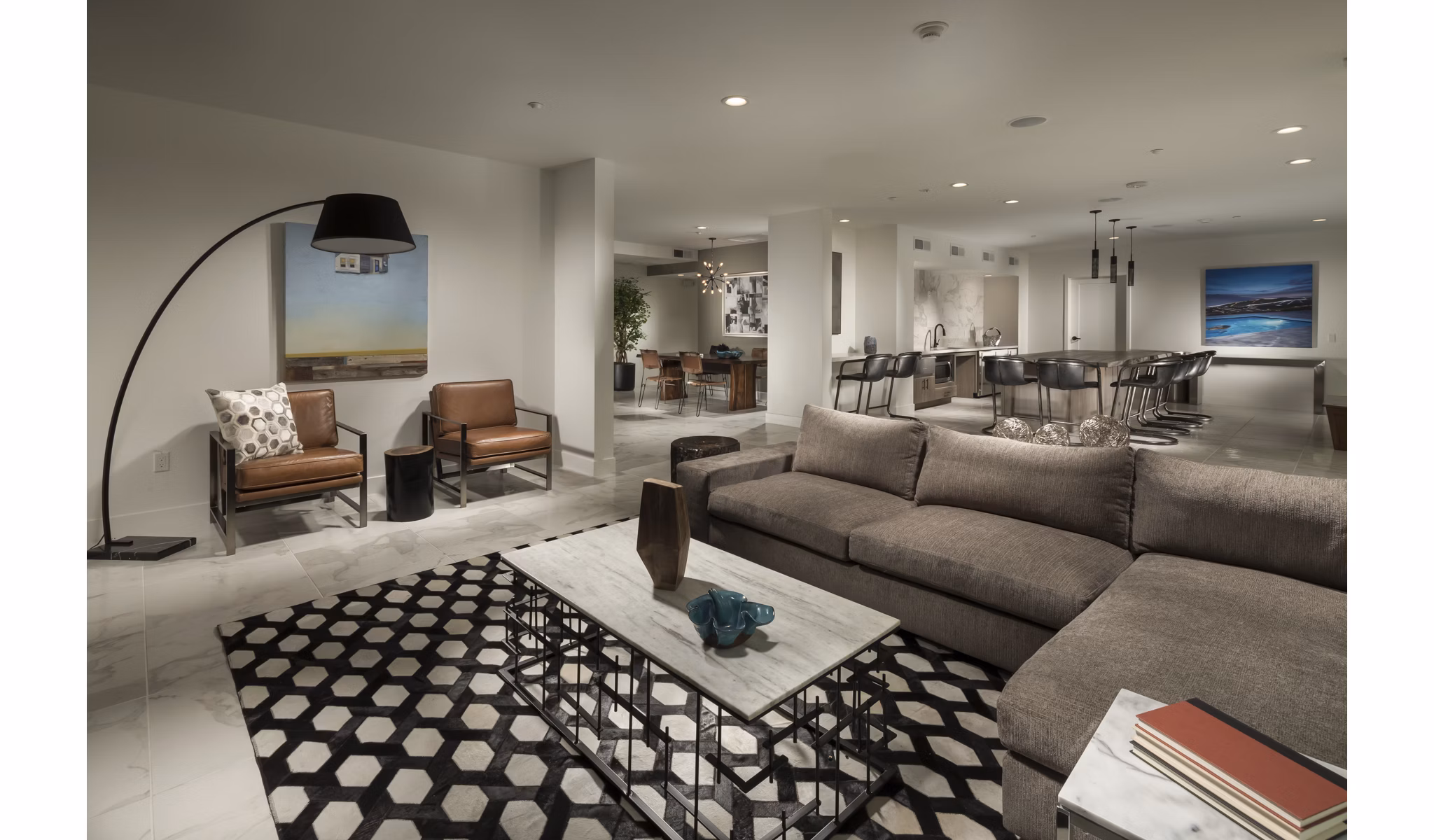 Clubhouse featuring elegant decor and seating areas at Luxe Pasadena Apartments