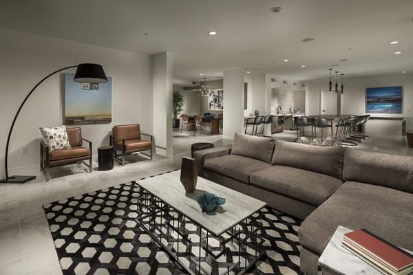 Clubhouse featuring elegant decor and seating areas at Luxe Pasadena Apartments