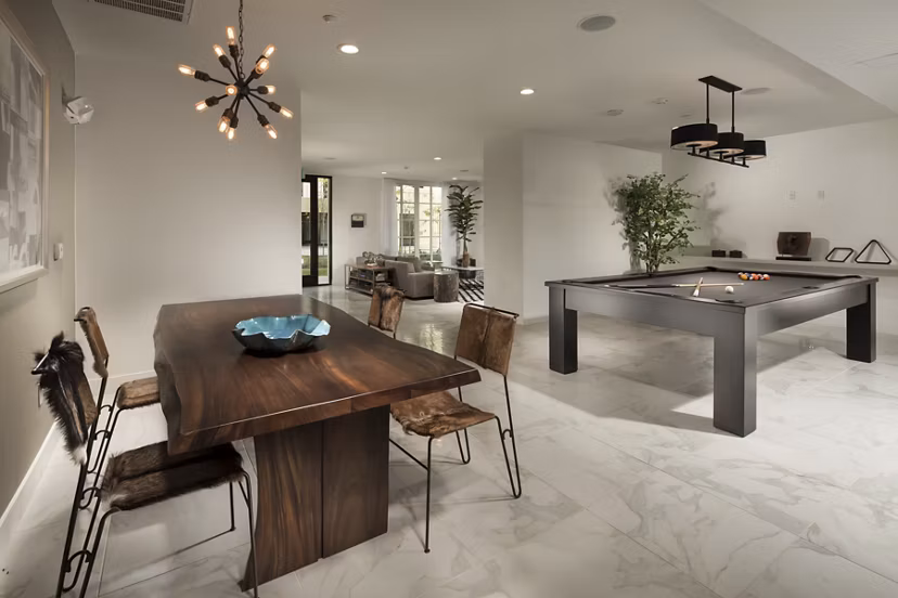 Game room featuring a pool table and lounge area at Luxe Pasadena Apartments
