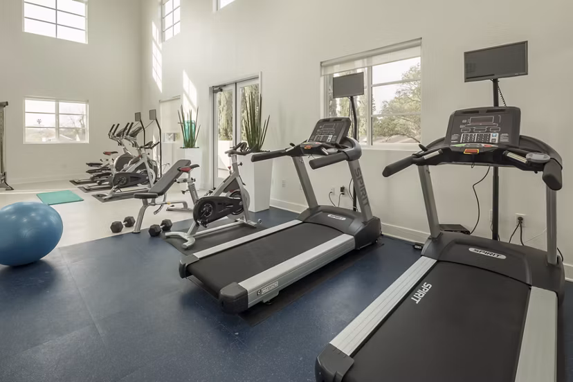 Fitness center with modern equipment at Luxe Pasadena Apartments