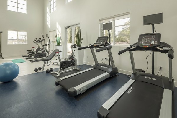 Fitness center with modern equipment at Luxe Pasadena Apartments