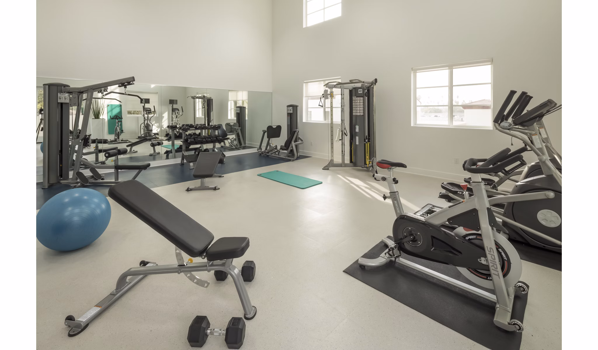 State-of-the-art fitness center with modern equipment at Luxe Pasadena Apartments