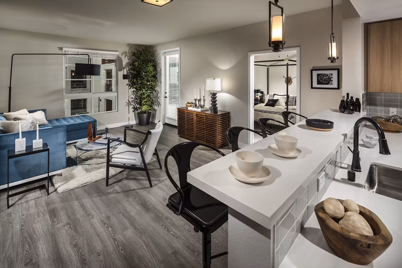Modern kitchen with stainless steel appliances at Luxe Pasadena Apartments
