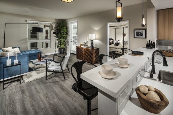Modern kitchen with stainless steel appliances at Luxe Pasadena Apartments