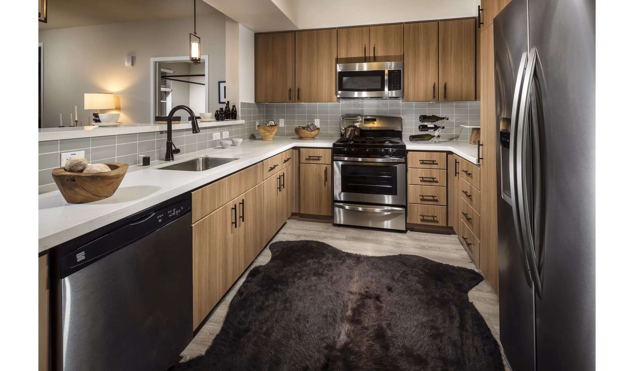 Kitchens with state-of-the-art appliances in Luxe Pasadena Apartments, offering a luxurious living experience in the heart of the city