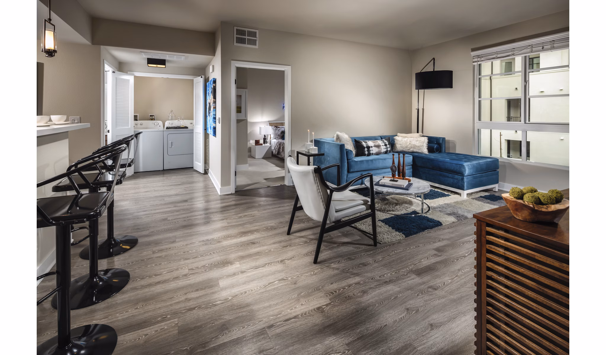 Spacious living room with modern decor at Luxe Pasadena Apartments