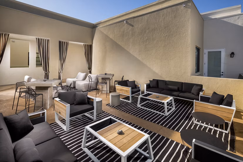 Scenic rooftop deck with lounge seating at Luxe Pasadena Apartments, offering luxury living in the heart of Pasadena