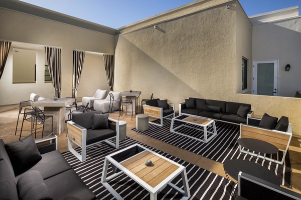 Scenic rooftop deck with lounge seating at Luxe Pasadena Apartments, offering luxury living in the heart of Pasadena