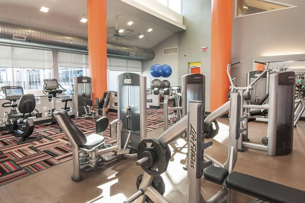 fitness center at The Ave at Norman Apartments