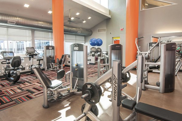 State-of-the-art fitness center with modern equipment at The Ave at Norman Apartments