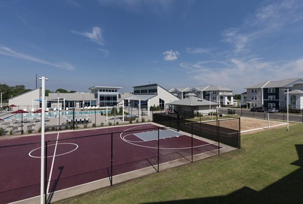 Sport court for basketball and tennis at The Ave at Norman Apartments