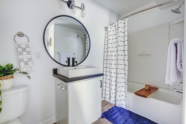 Luxury bathroom with modern fixtures at Copperwood Apartments