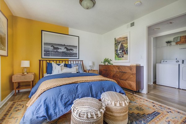 Cozy bedroom featuring modern design elements at Copperwood Apartments