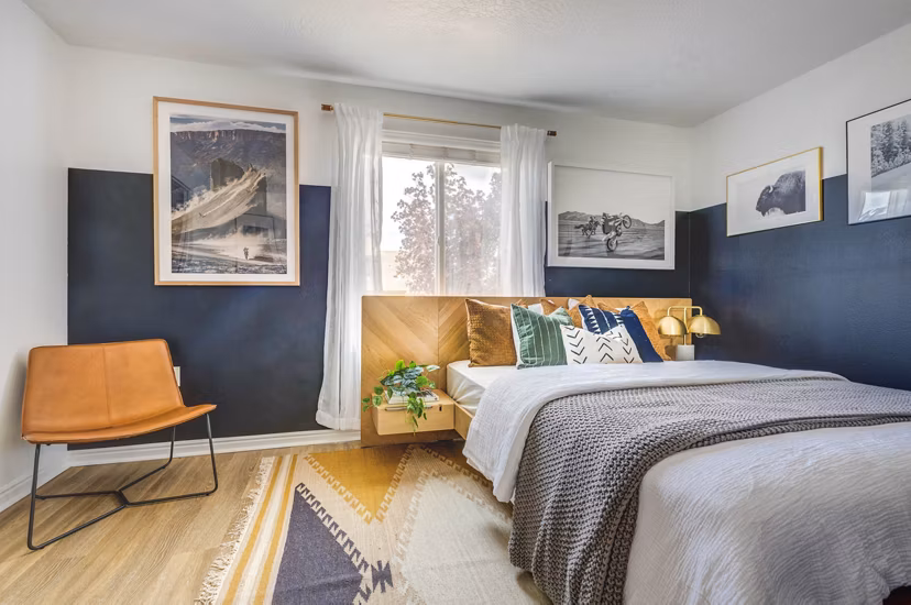 Cozy bedroom with elegant decor at Copperwood Apartments