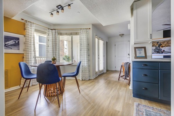 Dining area with modern furnishings at Copperwood Apartments, offering a luxurious ambiance perfect for entertaining and daily living