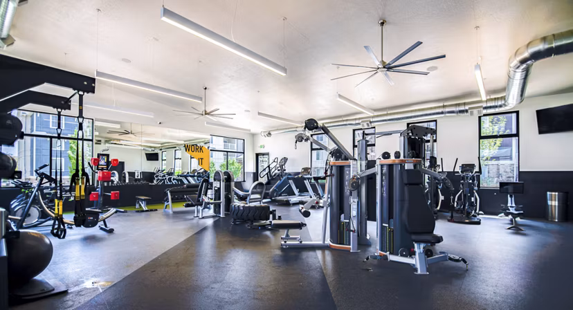 Modern fitness center with state-of-the-art equipment at Copperwood Apartments