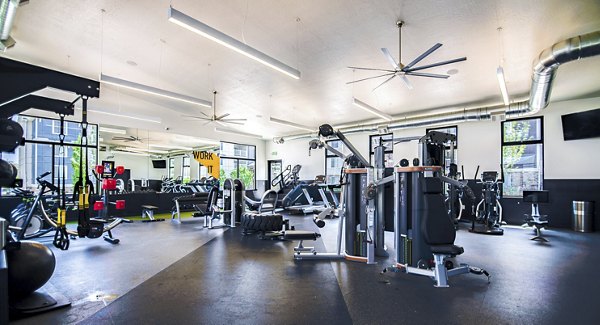Modern fitness center with state-of-the-art equipment at Copperwood Apartments