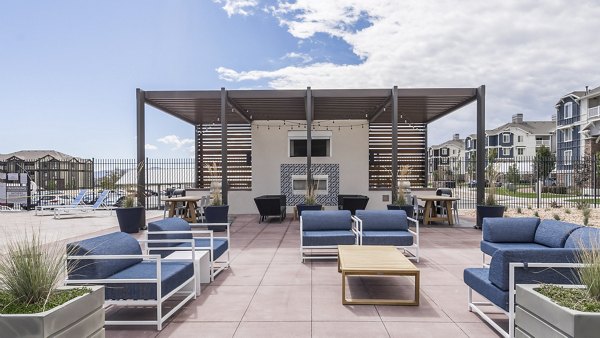 Copperwood Apartments: Rooftop deck with stunning views for residents to enjoy outdoor leisure activities and cityscape scenery